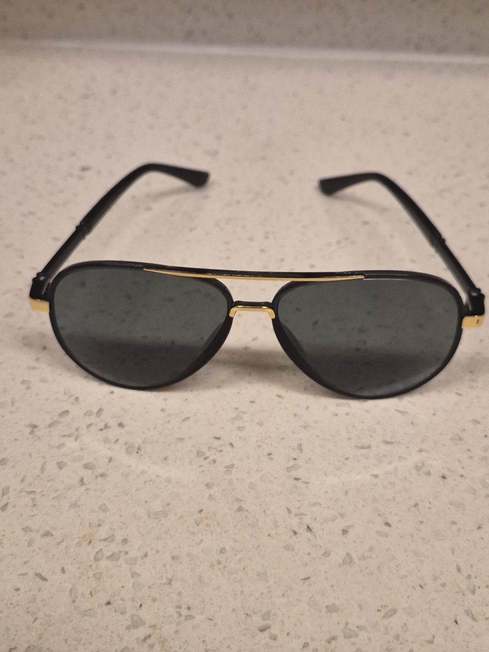 Aviator-Style Black Sunglasses with Gold Accents